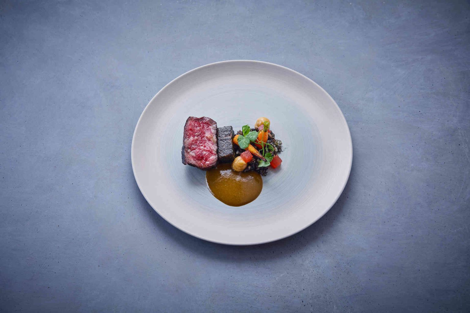 Austrian wagyu, watermelon, quinoa and Thai beef jus © Helge Kirchberger Photography