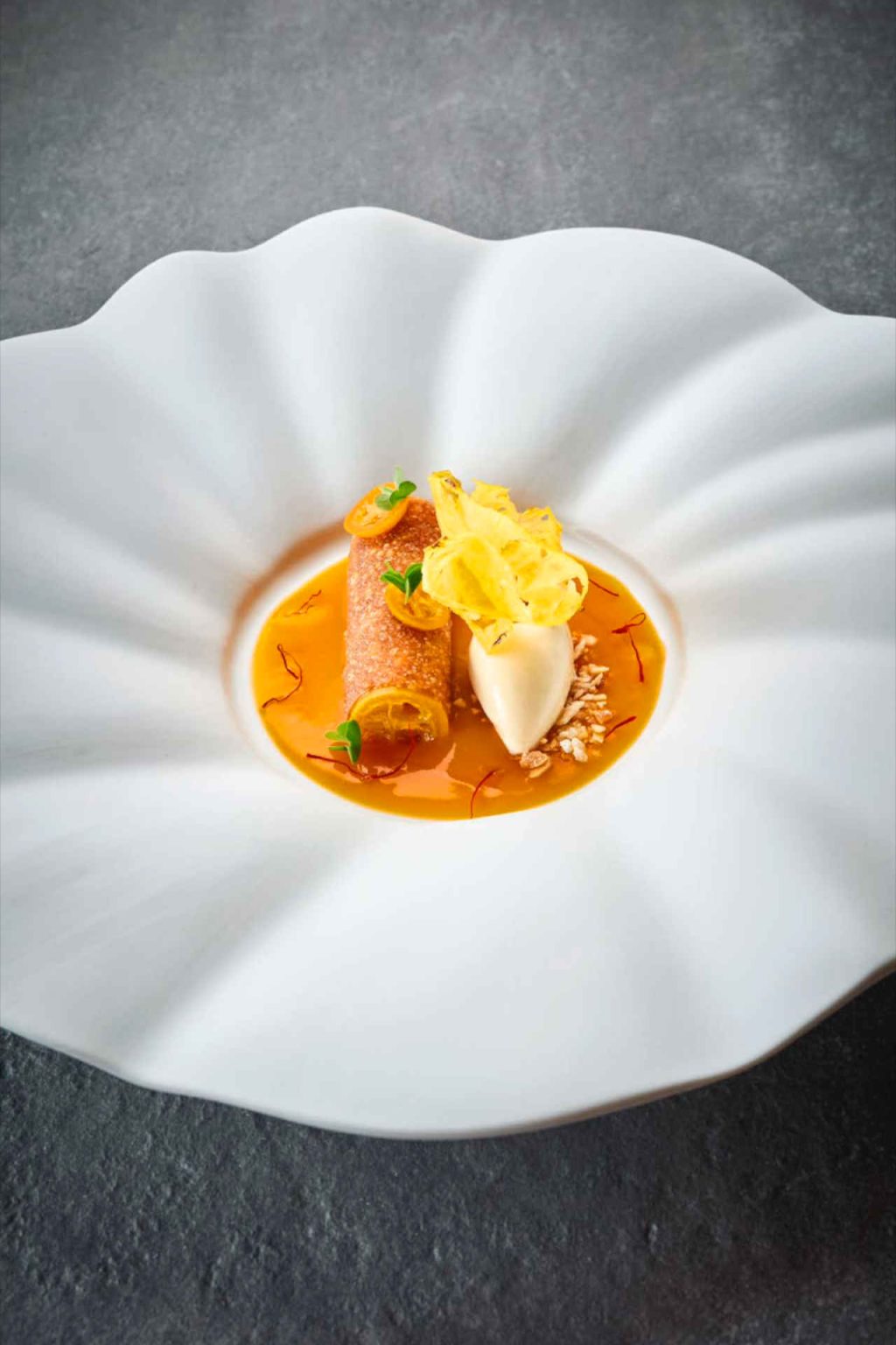 By Wolfgang Puck: Caramelized pineapple strudel, marzipan ice cream and candied kumquats © Helge Kirchberger Photography