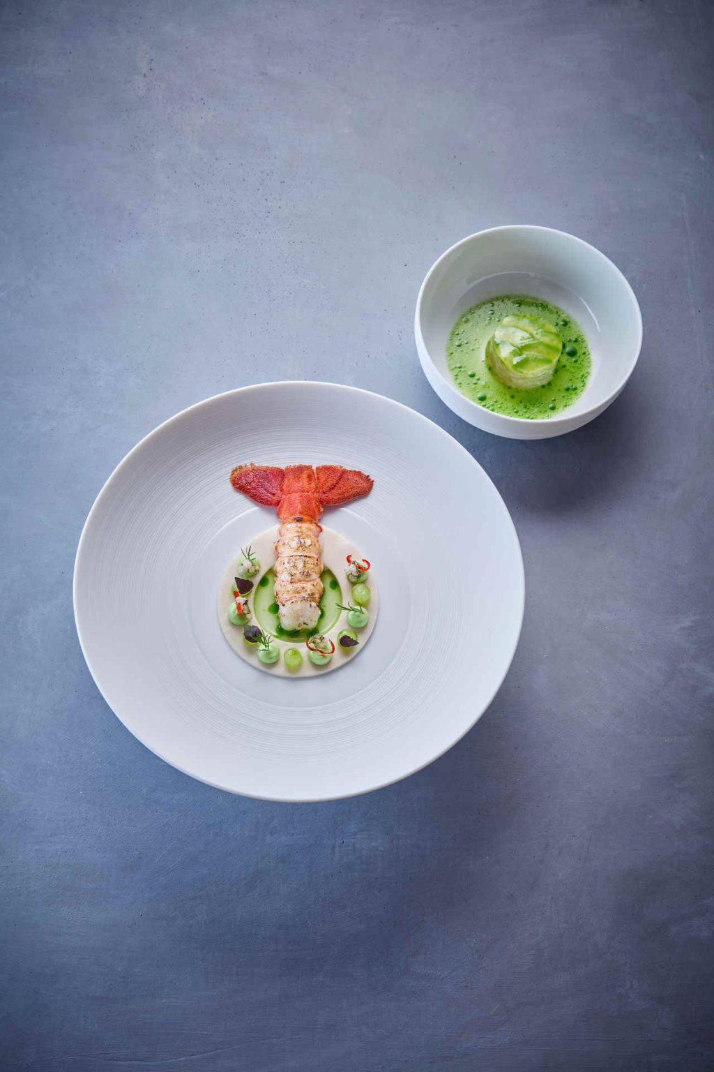 Langoustine, Tom Kha Kai, Cucumber, Sea bass, Avocado and Dill oil © Helge Kirchberger Photography