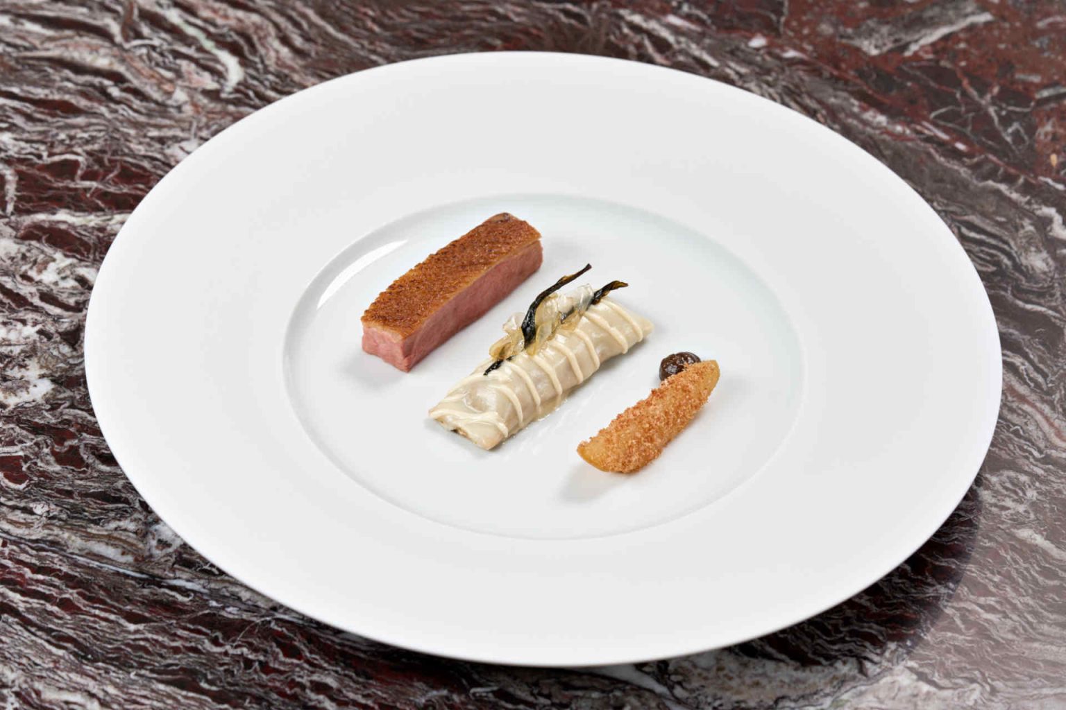 Challans duck with pickled and blackened pears © Tony Gigov Photography