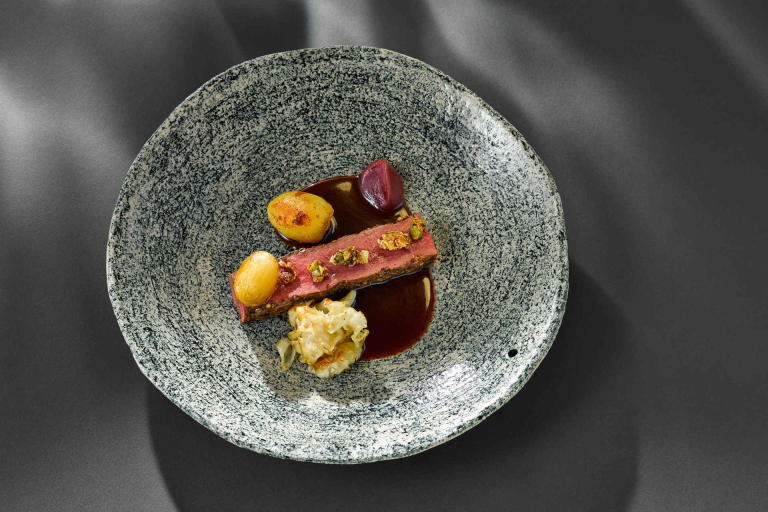 A composition with saddle of venison, photo provided