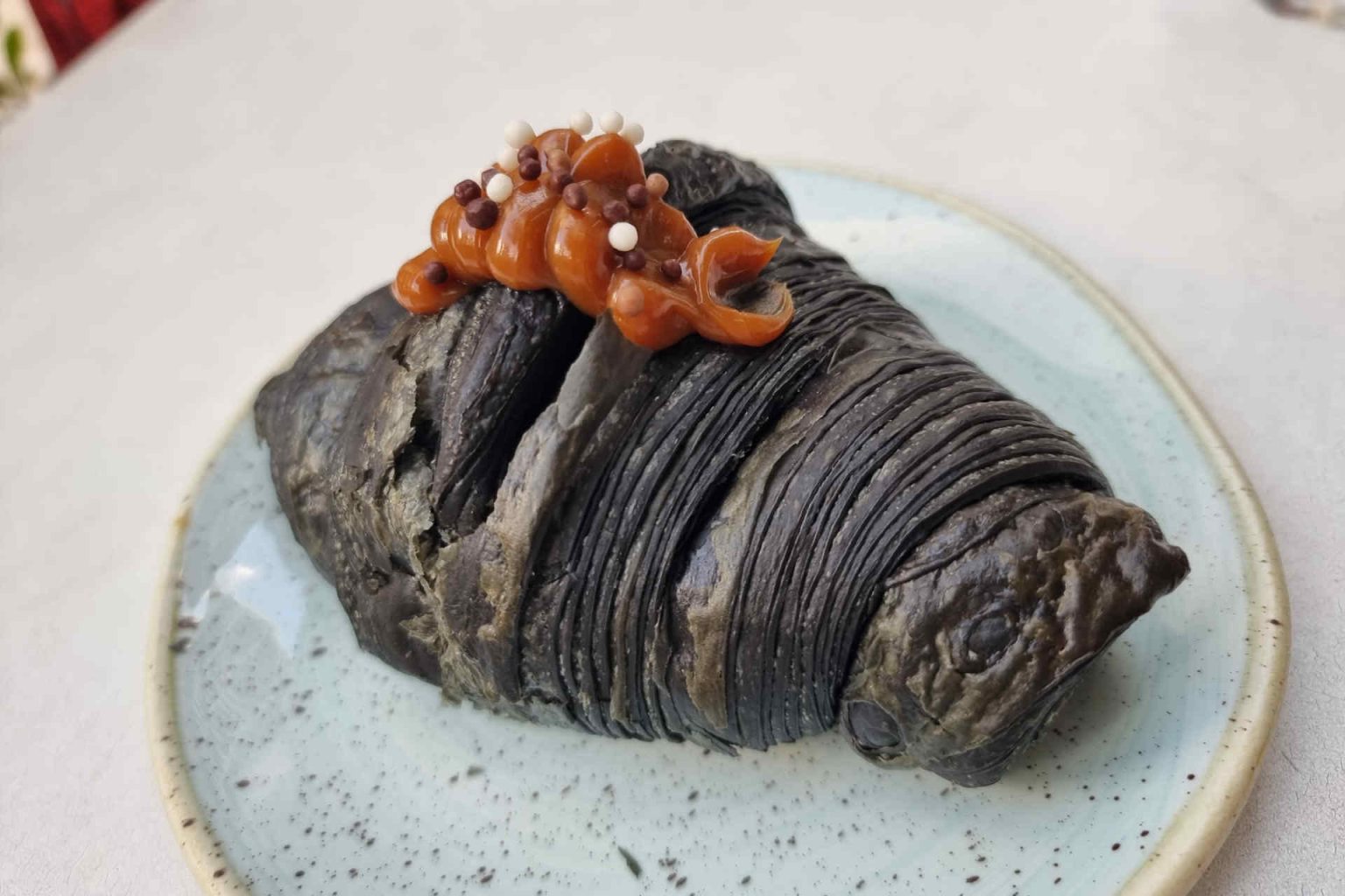 Charcoal croissant with pistachio filling at B-Bistro, Miami © Pierre Nierhaus