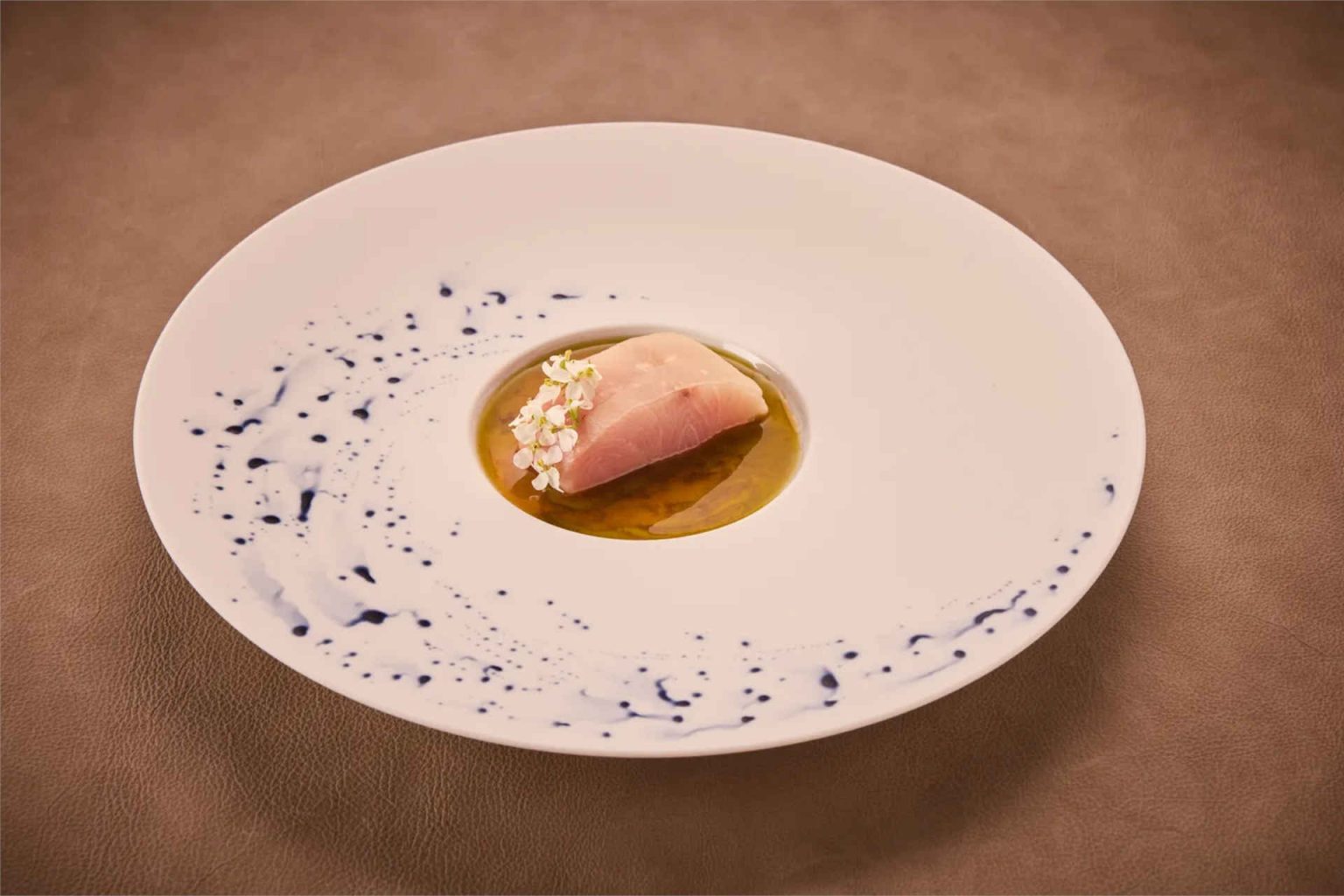 Hamachi, yuzu, pear, and wasabi flower © Helge Kirchberger Photography